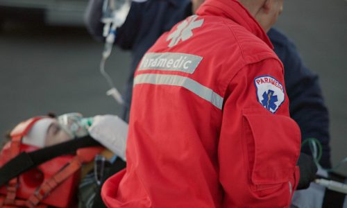 People, paramedic and help patient in outdoor on scene for emergency, rescue and support. Emt team,.